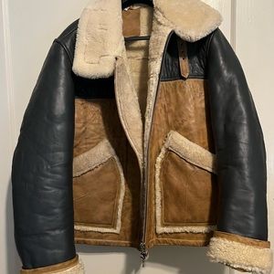Leather bomber jacket with Sherpa lining.